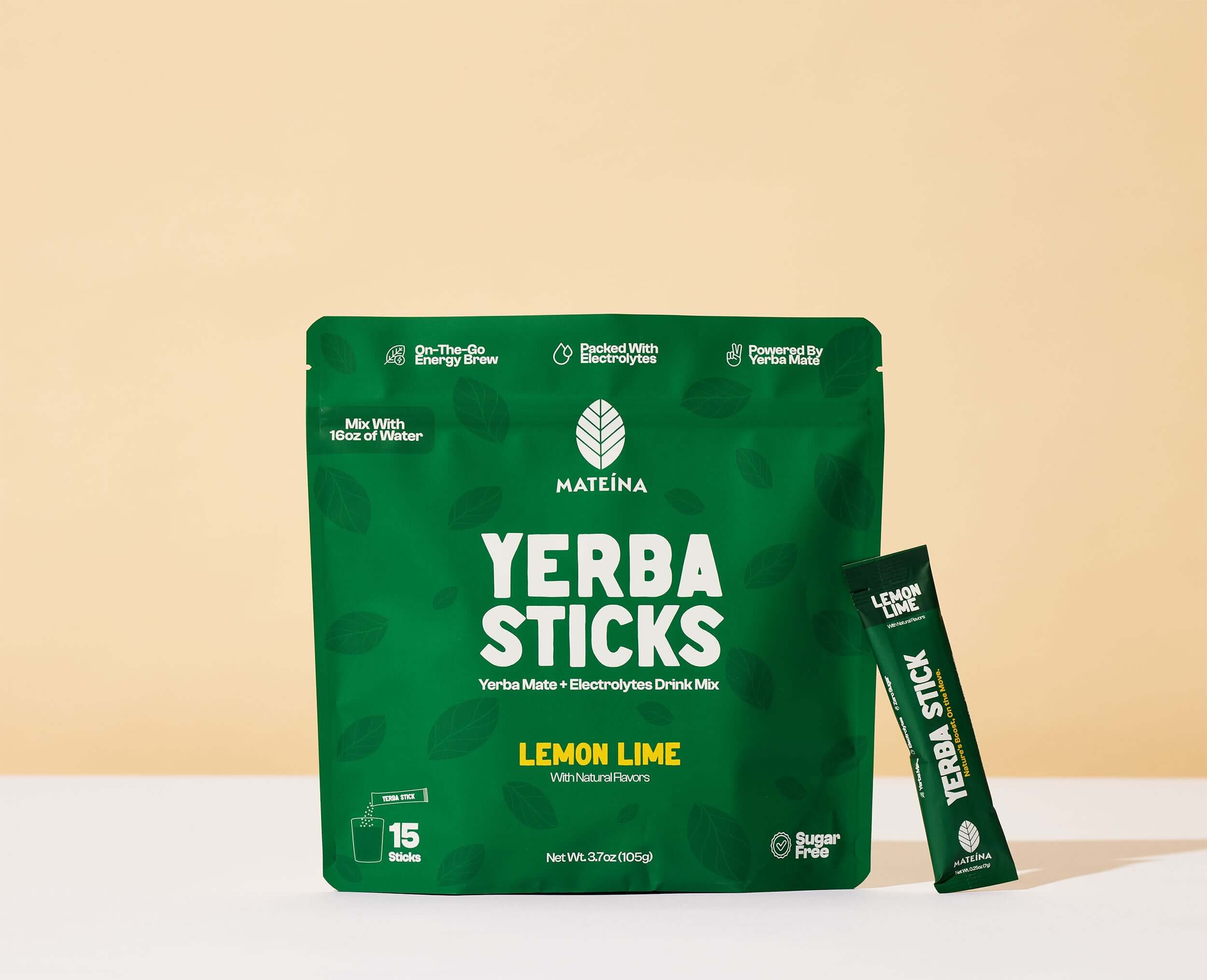Yerba Mate + Electrolytes - Lemon Lime drink mix packaging with individual stick on a beige background.